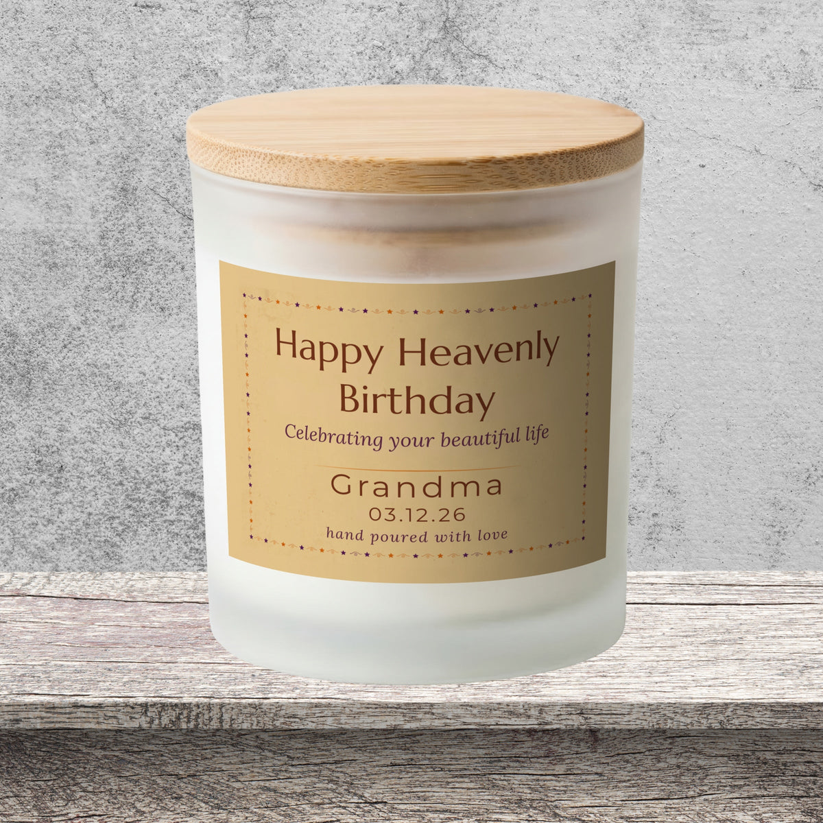 DESIGN F - Happy Heavenly Birthday personalized frosted candle on a stone backdrop
