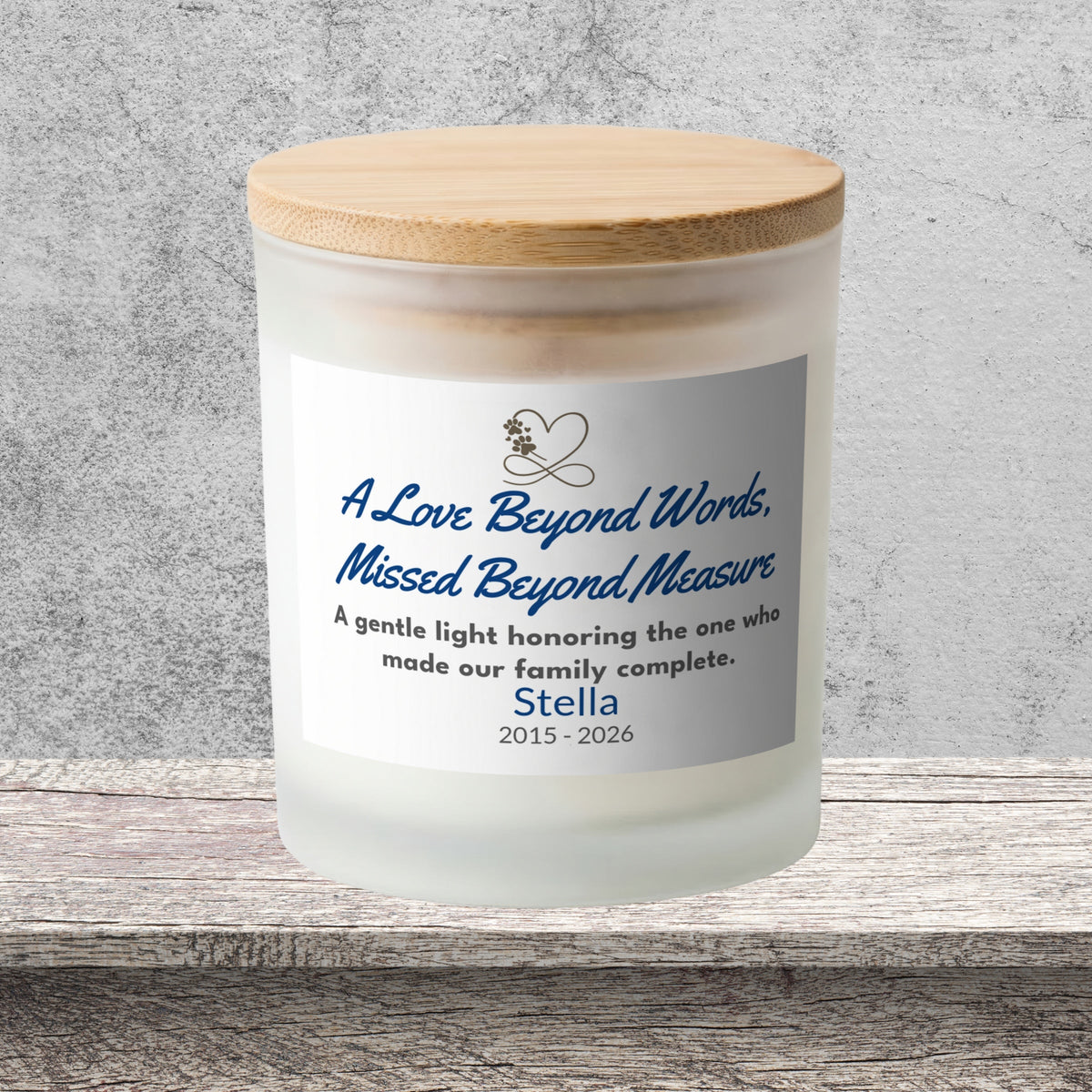 DESIGN D - A Love Beyond Words personalized frosted candle on a stone backdrop