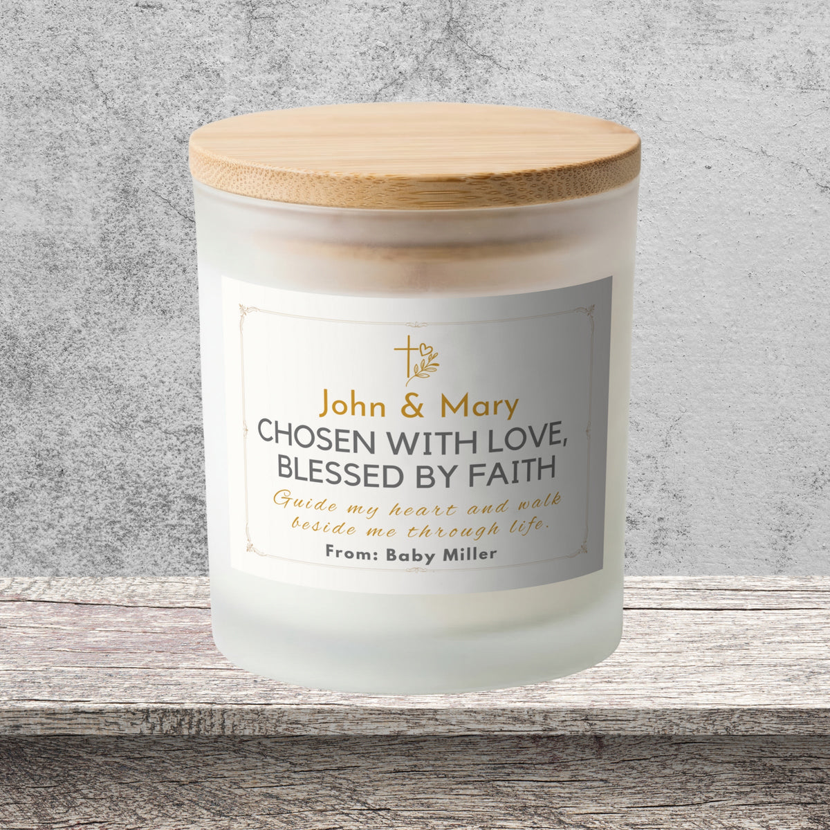 DESIGN B - Chosen With Love, Blessed by Faith personalized frosted candle on a stone backdrop