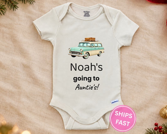 Going to Auntie's personalized baby bodysuit with vintage station wagon on a cream blanket