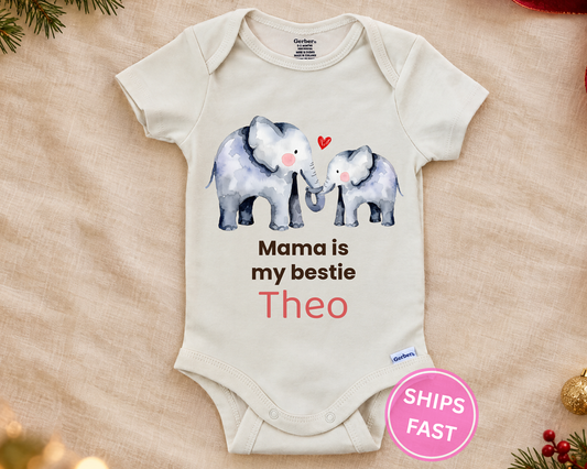 Mama Is My Bestie personalized baby bodysuit with the elephant design on a cream blanket
