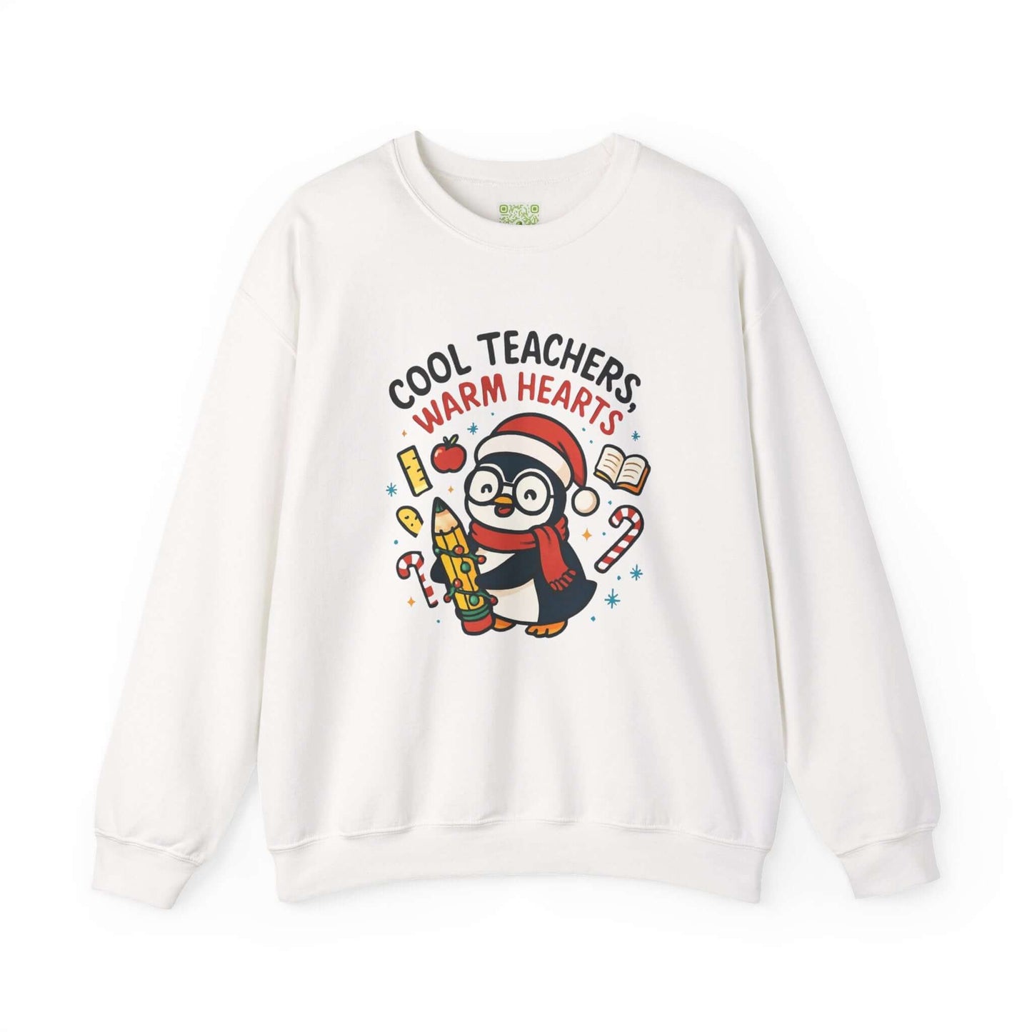 White sweatshirt featuring a cute penguin graphic with the text 'Cool Teachers Warm Hearts', perfect for teacher holiday gifts.