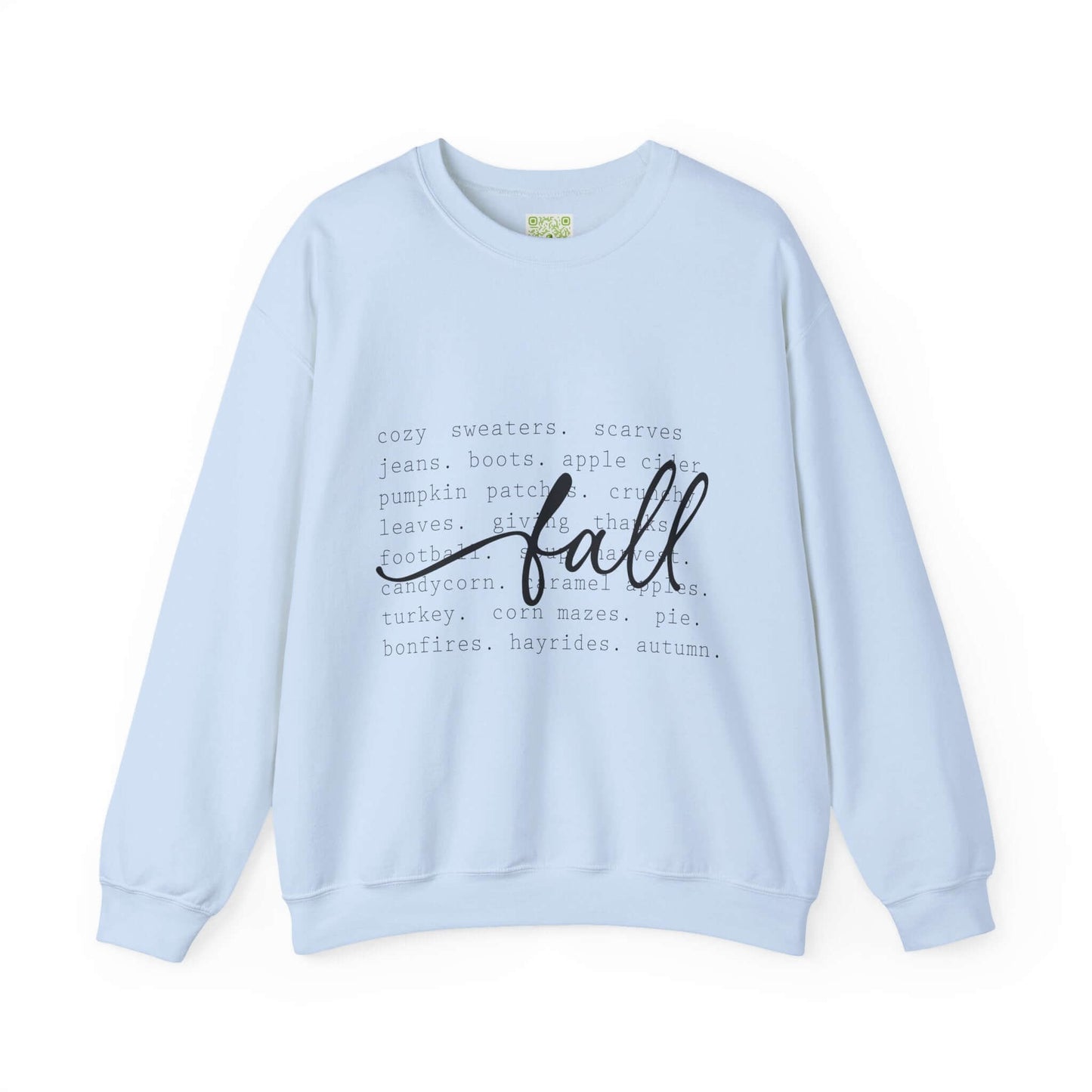 Light blue cozy fall sweatshirt with autumn-themed text and graphics, perfect for sweater weather.