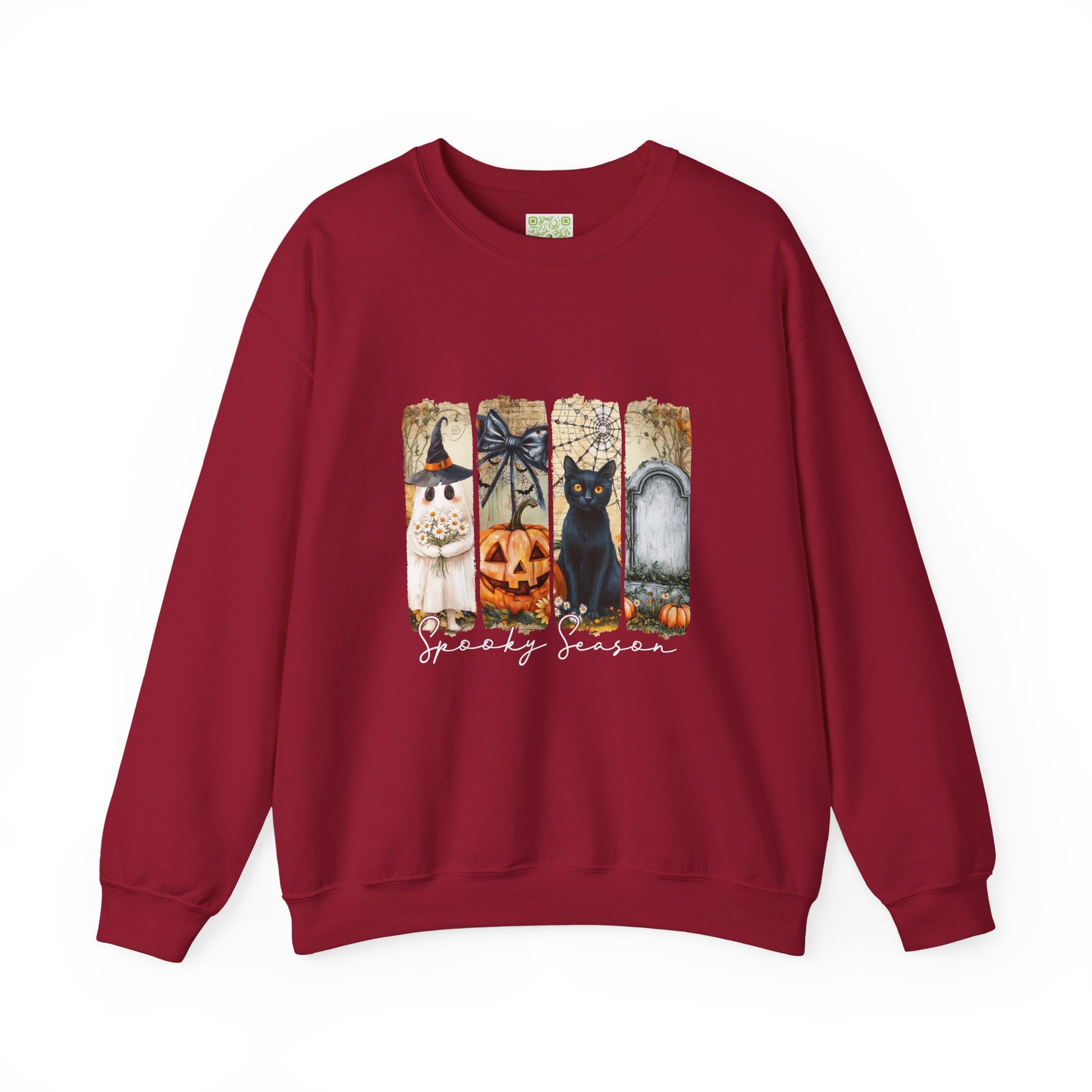 Spooky Season sweatshirt featuring a witch, pumpkin, black cat, and gravestone design on a burgundy crewneck.