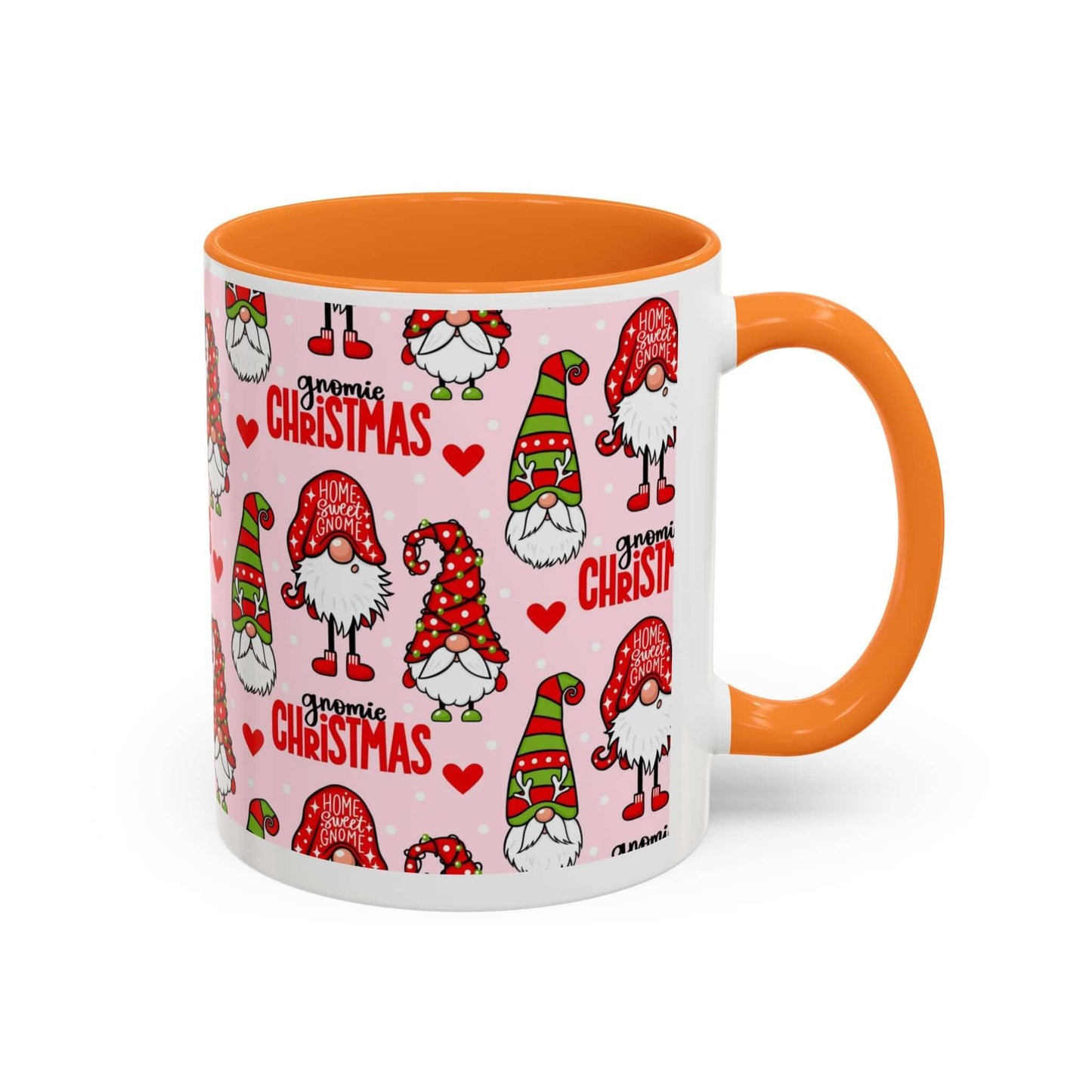 Festive Christmas gnome coffee mug with orange handle, whimsical gnomes and hearts on a pink background.