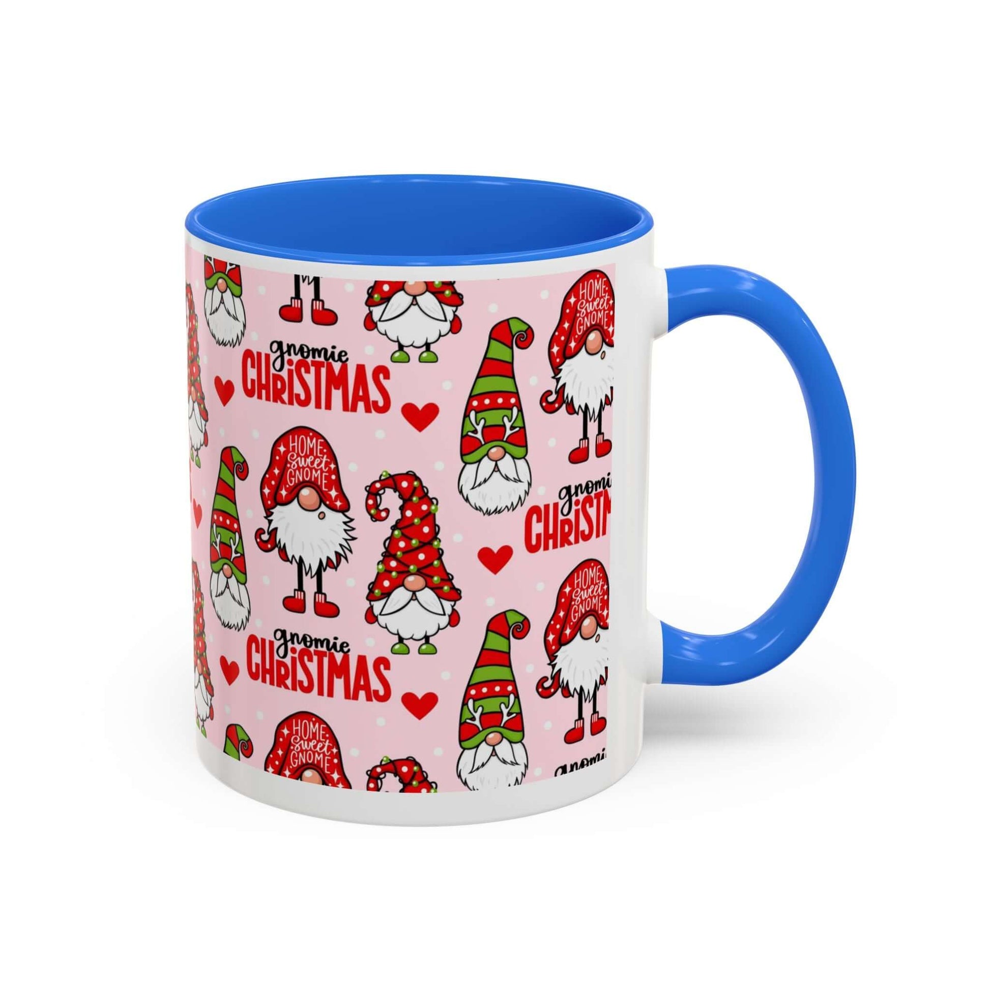 Festive Christmas gnome coffee mug with blue handle and pink background featuring playful gnome designs and holiday text.