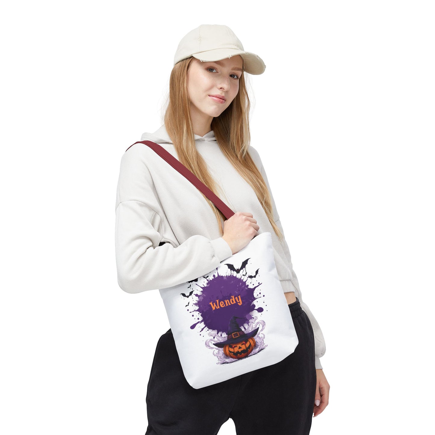 Personalized Kids Halloween Treat Bag featuring a witch hat and pumpkins, custom name 'Wendy' in spooky design.