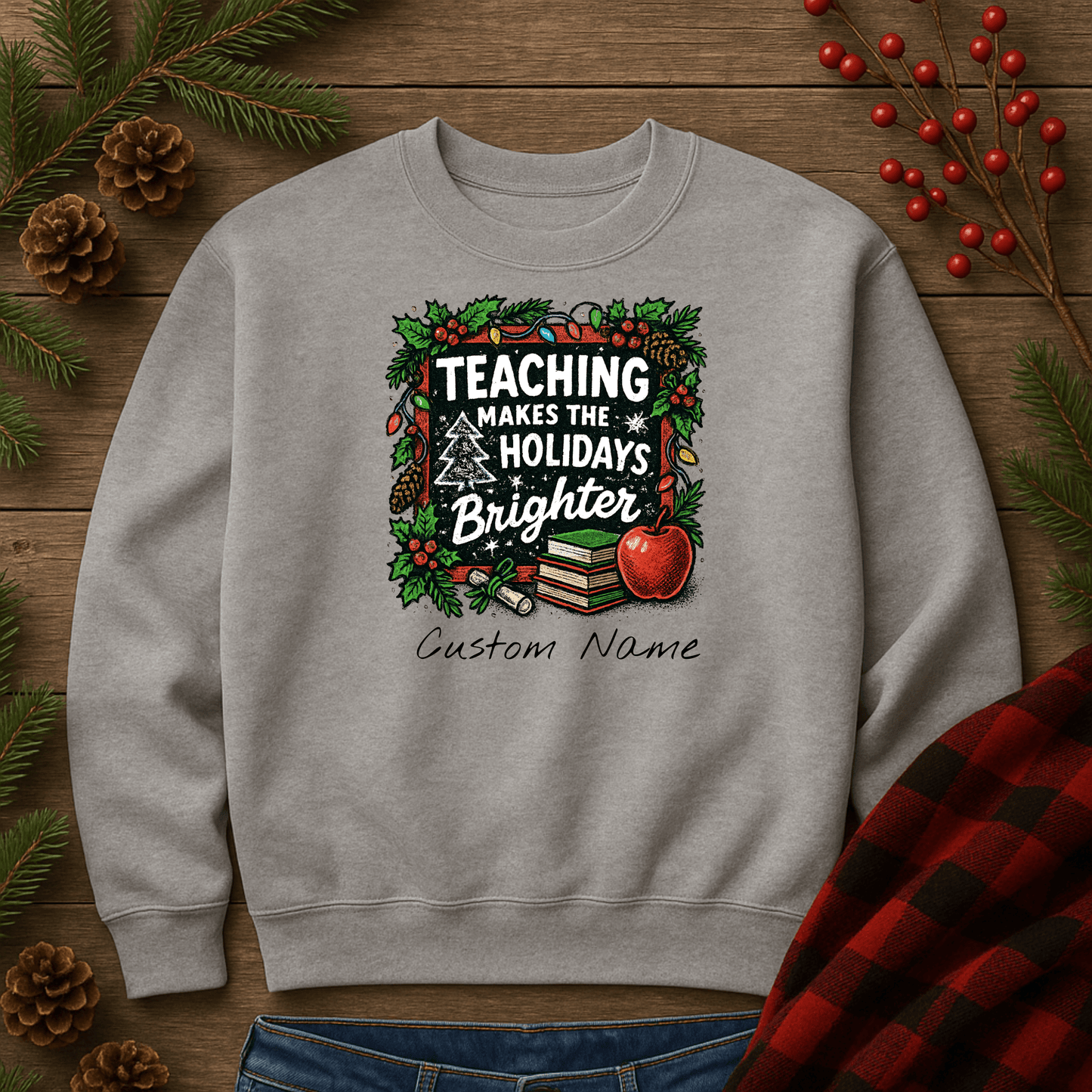 Personalized gray holiday sweatshirt with 'Teaching Makes the Holidays Brighter' design and custom name option.