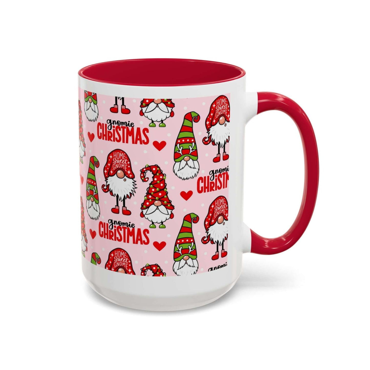 Festive Christmas gnome coffee mug with red handle and playful gnome patterns on a pink background.