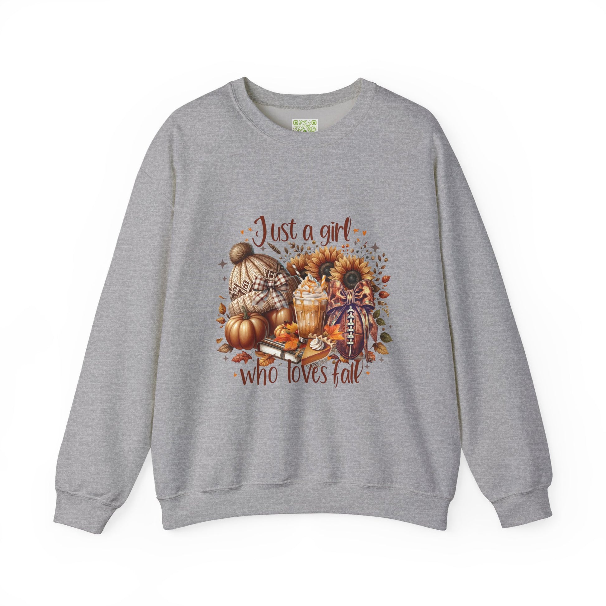 Woman wearing a cozy white sweatshirt with autumn-themed graphic saying 'Just a girl who loves fall'.