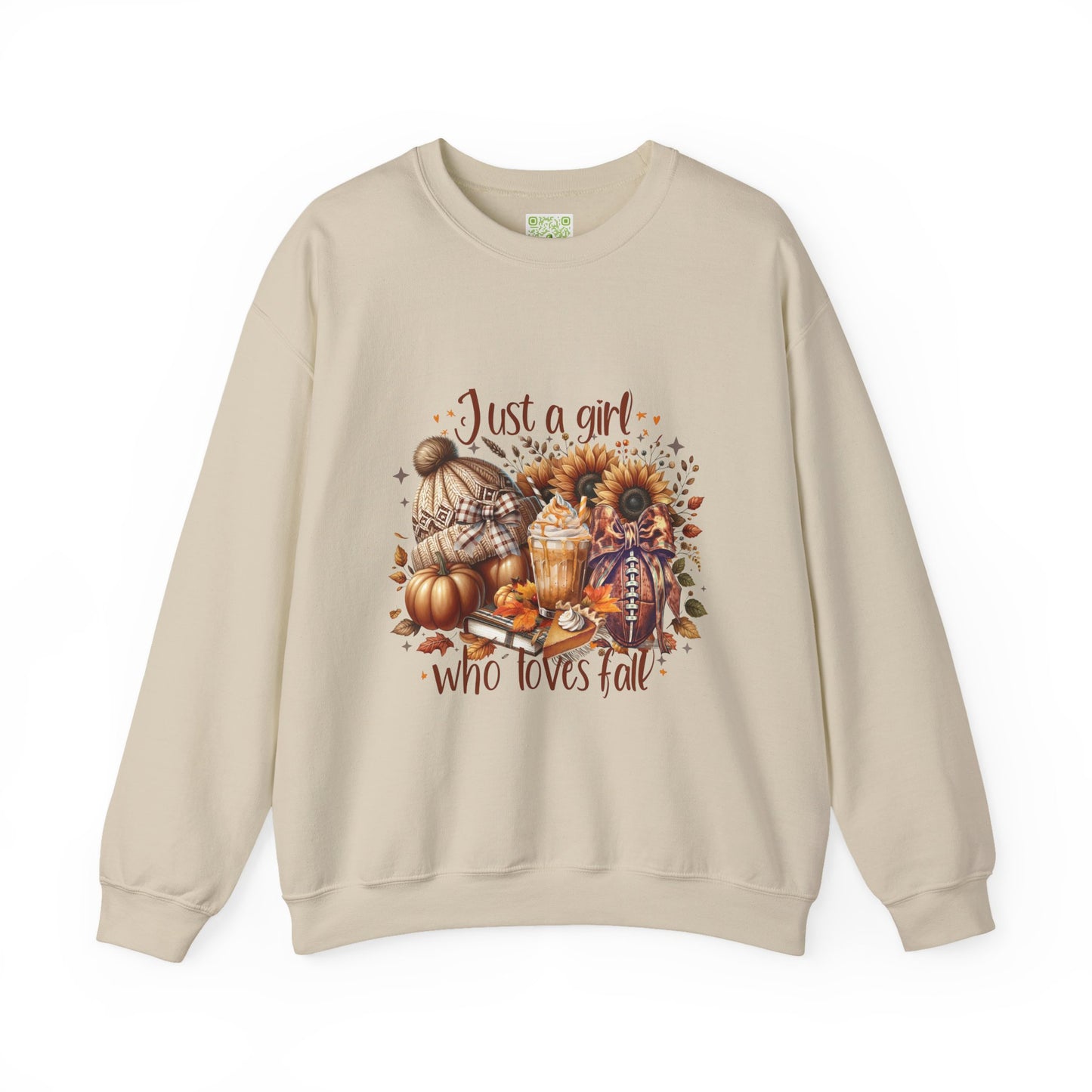 Woman wearing a cozy white sweatshirt with autumn-themed graphic saying 'Just a girl who loves fall'.