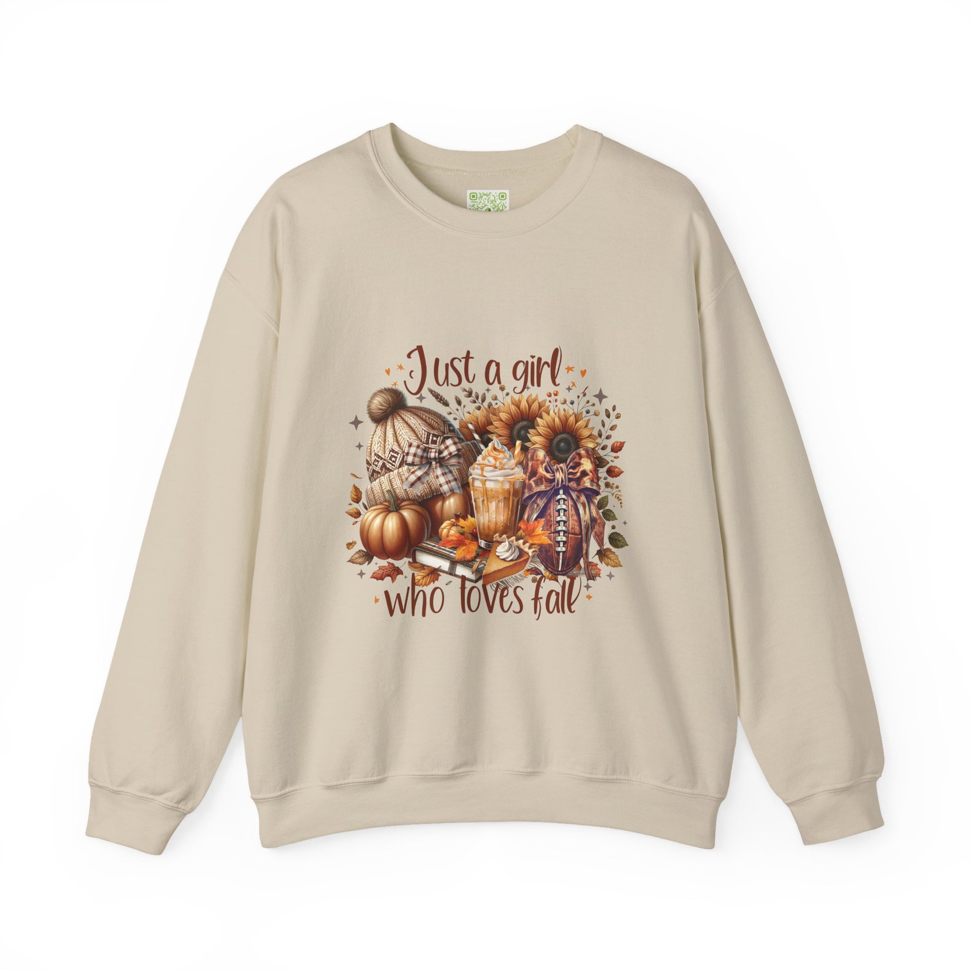 Woman wearing a cozy white sweatshirt with autumn-themed graphic saying 'Just a girl who loves fall'.
