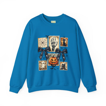 Halloween themed blue sweatshirt featuring spooky graphics including a pumpkin, skeleton, and ghost.