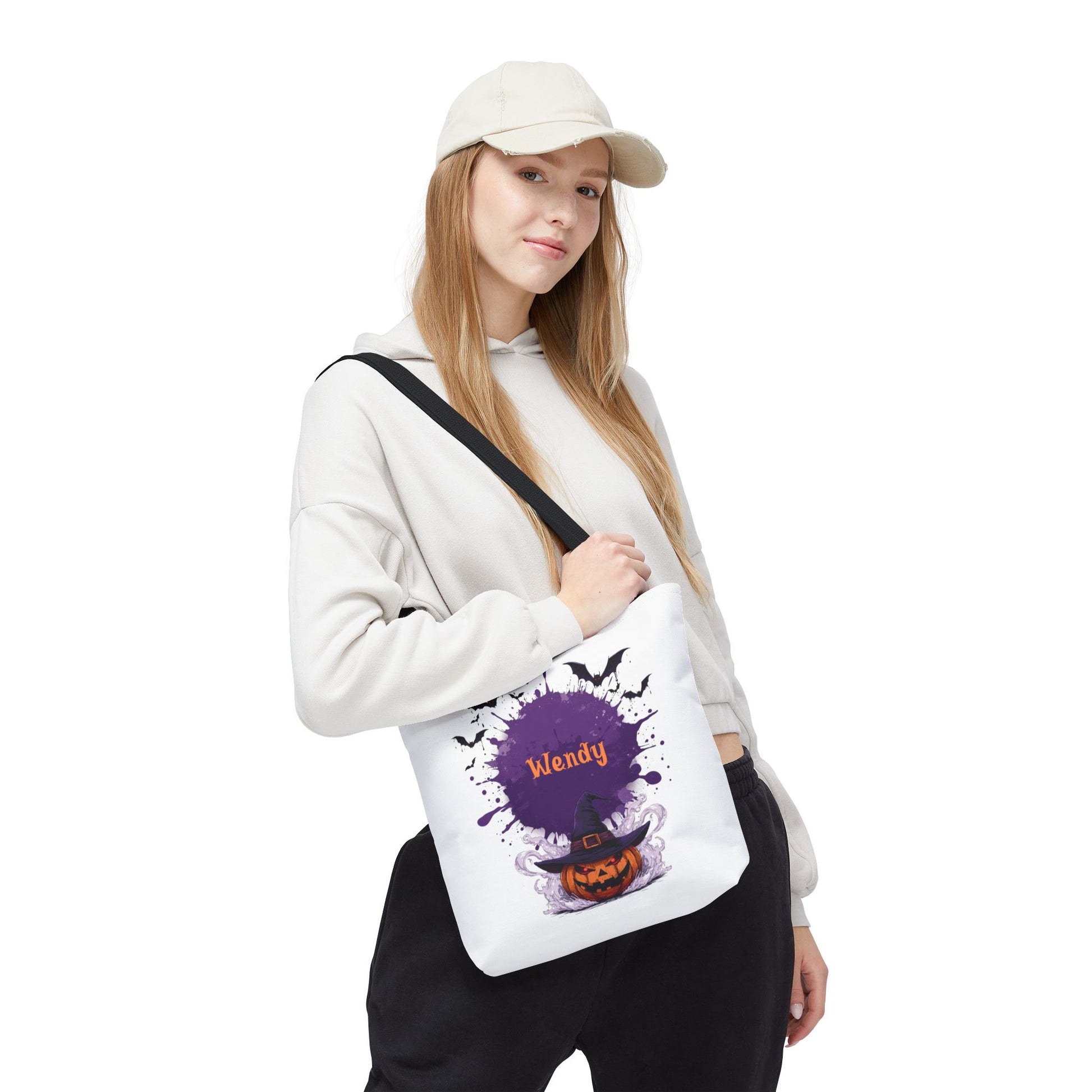 Personalized Kids Halloween Treat Bag featuring a witch hat and pumpkins, custom name 'Wendy' in spooky design.