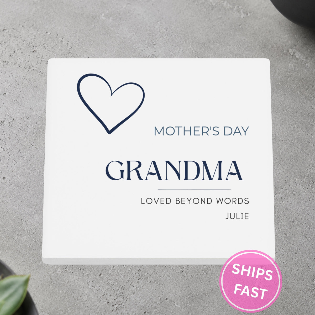 Loved Beyond Words Heart personalized ceramic coaster on a gray stone surface