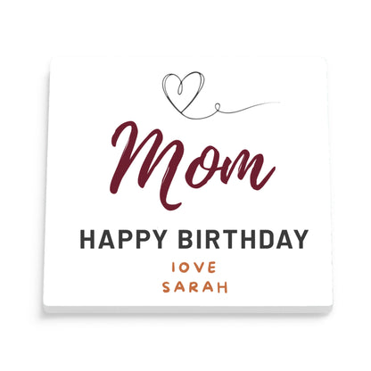 DESIGN D - Script Mom Birthday Heart personalized ceramic coaster, front view of the square glossy white coaster