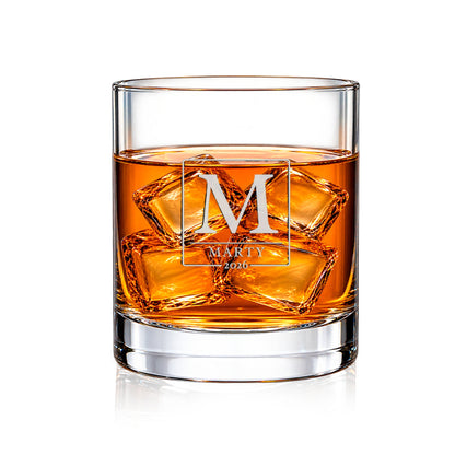 DESIGN A - Initial & Name Monogram personalized engraved whiskey glass with whiskey and ice on a white background
