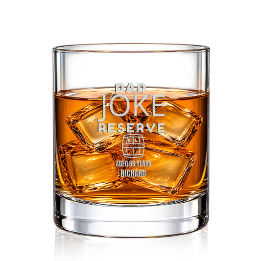DESIGN C - Dad Joke Reserve personalized engraved whiskey glass with whiskey and ice on a white background