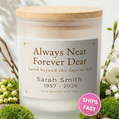 Always Near, Forever Dear personalized frosted candle with bamboo lid in a lifestyle scene with greenery