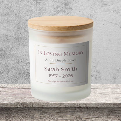 DESIGN A - In Loving Memory personalized frosted candle on a stone backdrop