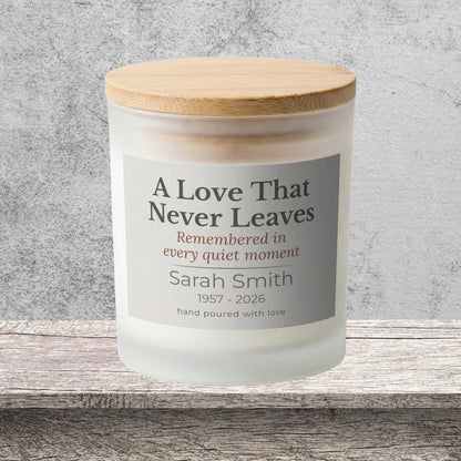 DESIGN B - A Love That Never Leaves personalized frosted candle on a stone backdrop