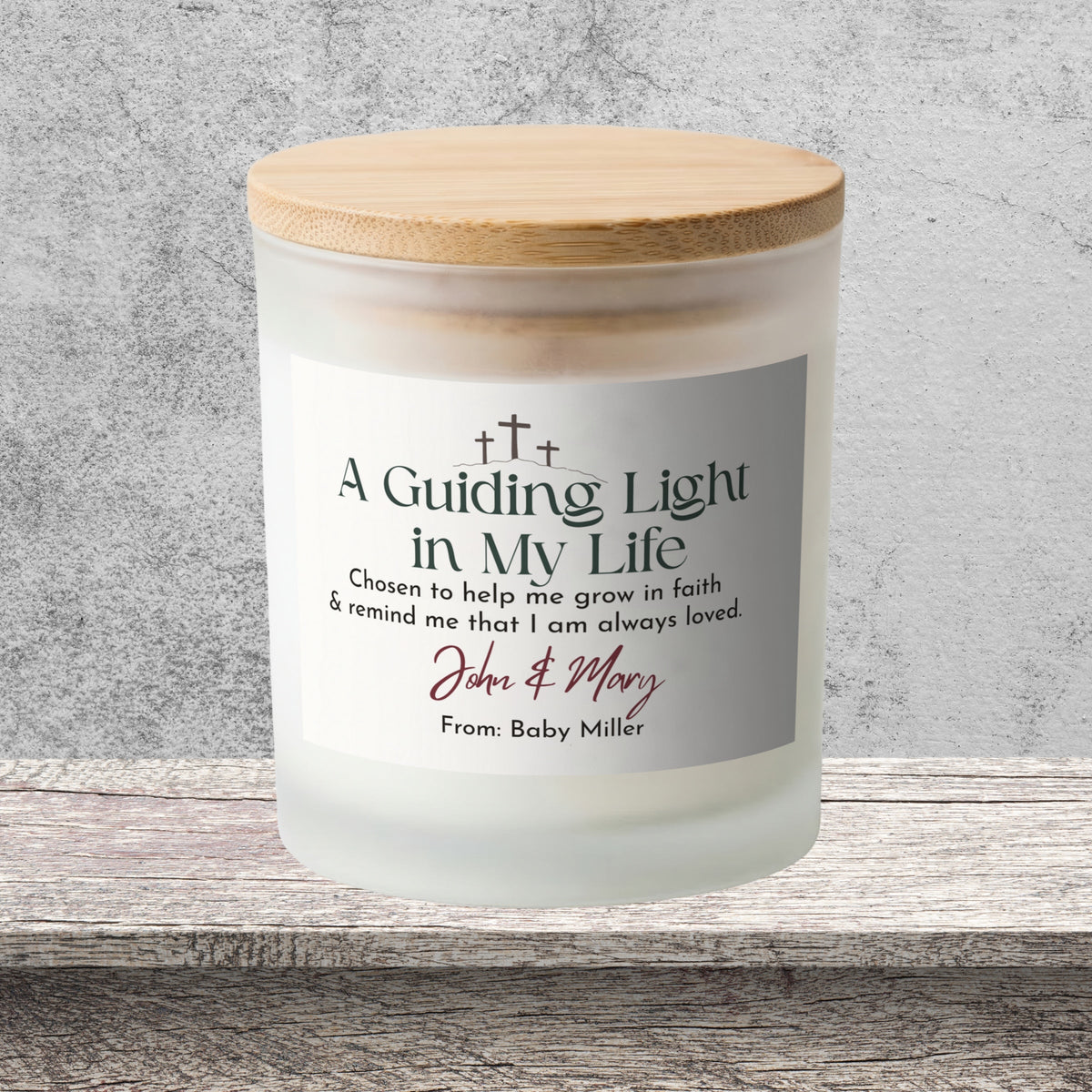DESIGN D - A Guiding Light in My Life personalized frosted candle on a stone backdrop