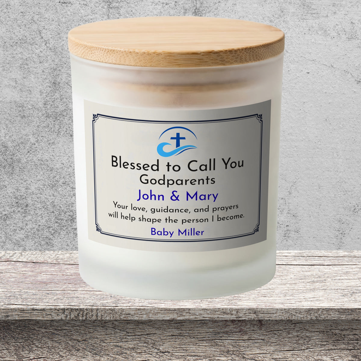 DESIGN E - Blessed to Call You Godparents personalized frosted candle on a stone backdrop