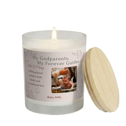 My Godparents, My Forever Guides personalized frosted candle, lit with the bamboo lid set aside, on a white background