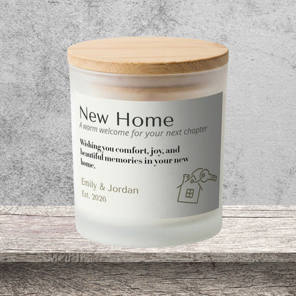 DESIGN B - A Warm Welcome for Your Next Chapter personalized frosted candle on a stone backdrop