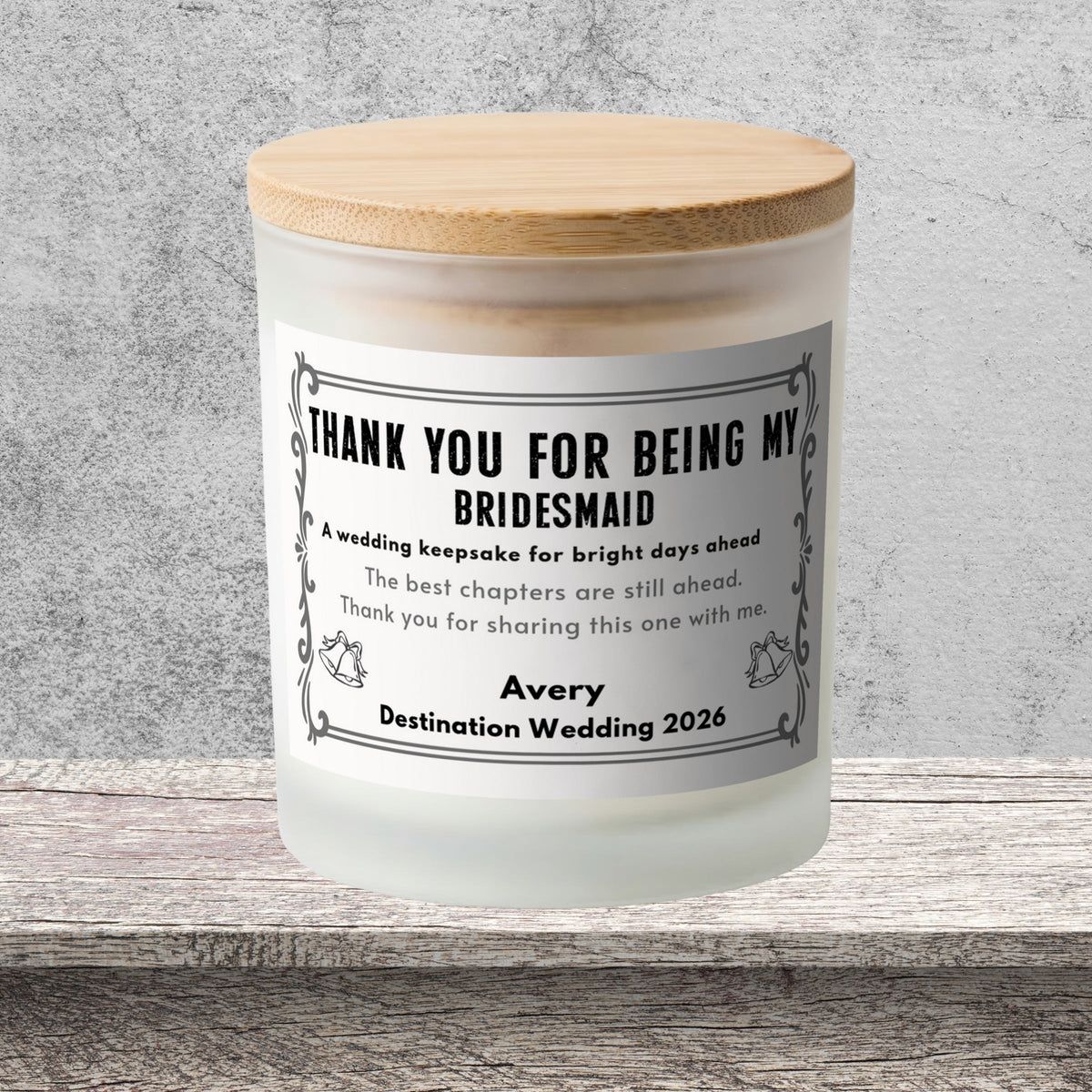 DESIGN F - The Best Chapters Are Still Ahead personalized frosted candle on a stone backdrop