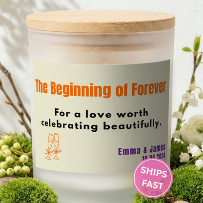 The Beginning of Forever personalized frosted candle with bamboo lid in a lifestyle scene with greenery