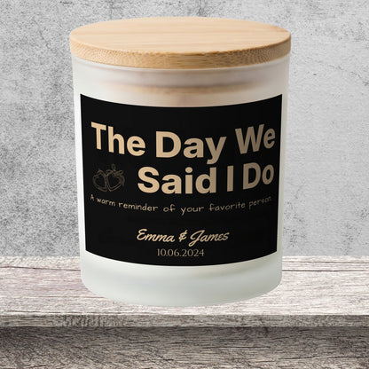 DESIGN E - The Day We Said I Do personalized frosted candle on a stone backdrop