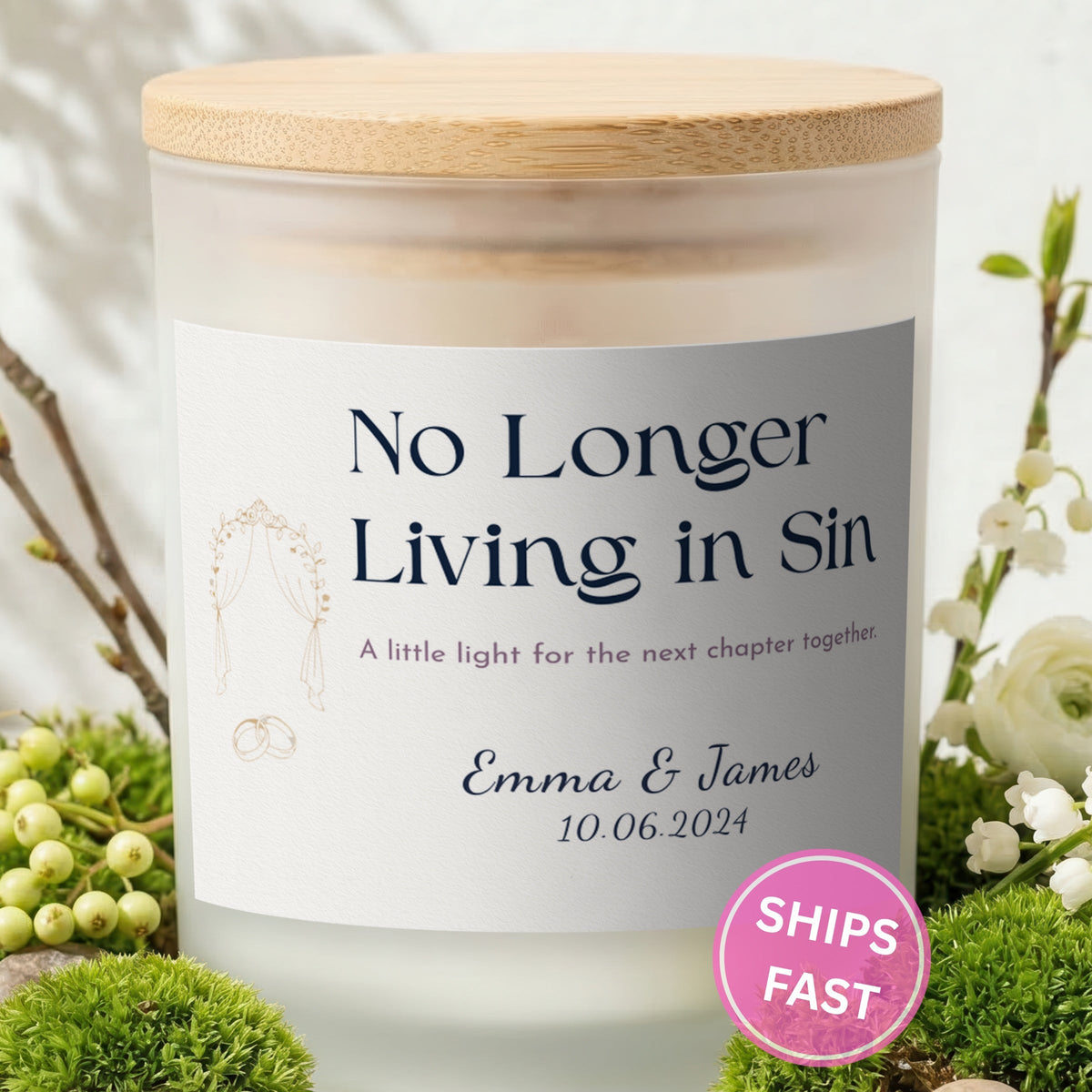 A Little Light for the Next Chapter personalized frosted candle with bamboo lid in a lifestyle scene with greenery