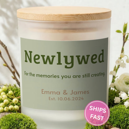 Memories You Are Still Creating personalized frosted candle with bamboo lid in a lifestyle scene with greenery