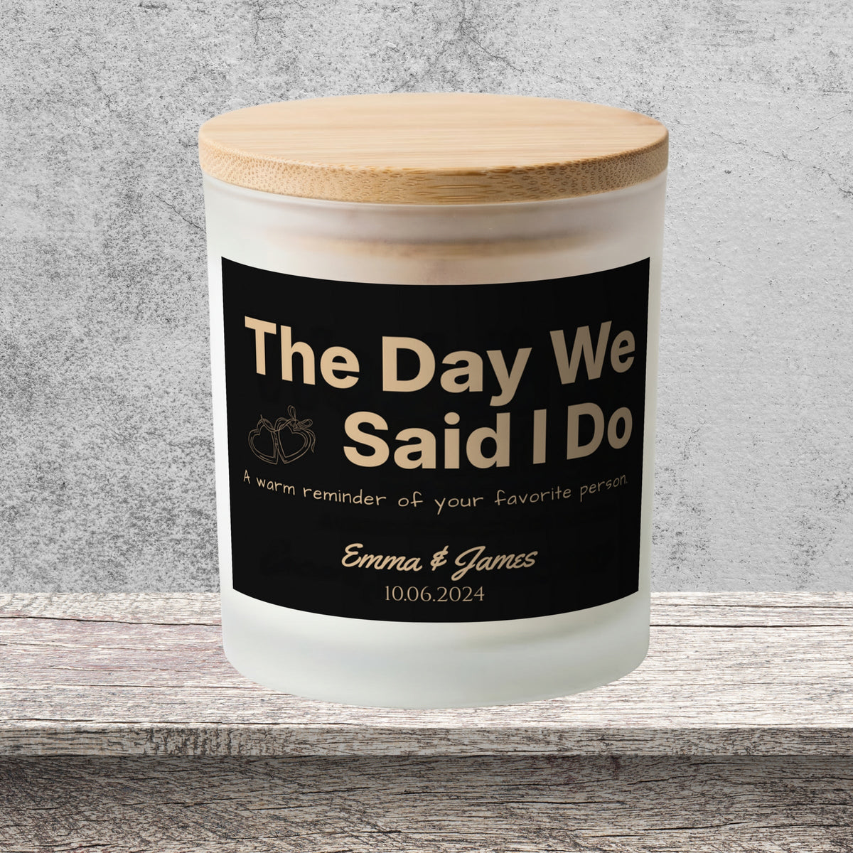 DESIGN E - The Day We Said I Do personalized frosted candle on a stone backdrop