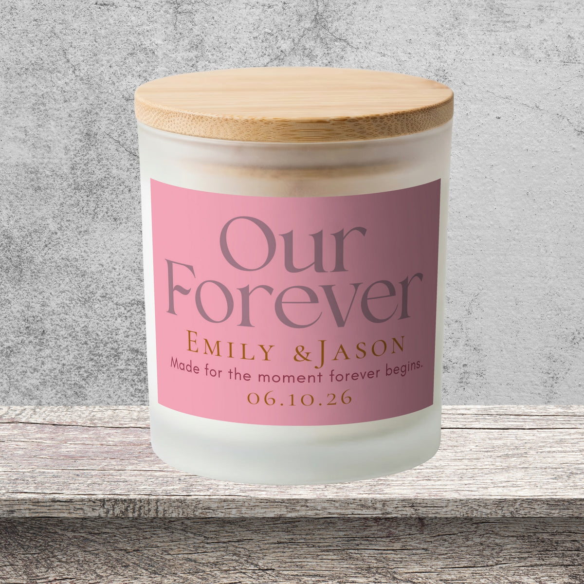 DESIGN C - Our Forever personalized frosted candle on a stone backdrop