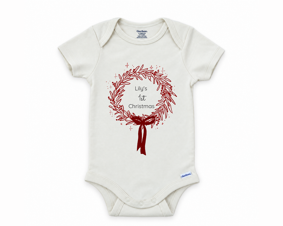 DESIGN F - 1st Christmas Wreath personalized baby bodysuit design on a white background