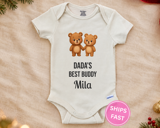 Dada's Best Buddy personalized baby bodysuit with two teddy bears holding hands on a cream blanket