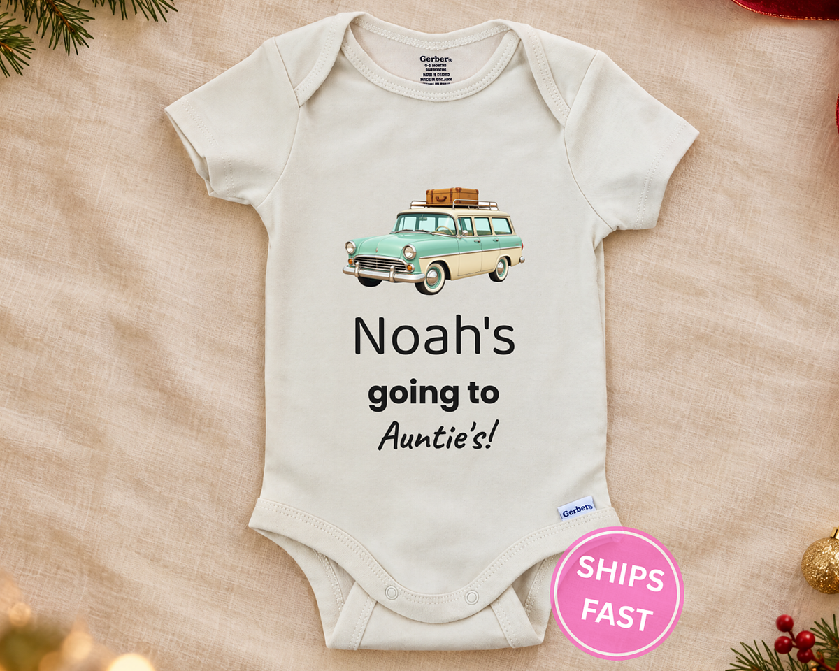 Going to Auntie's personalized baby bodysuit with vintage station wagon on a cream blanket