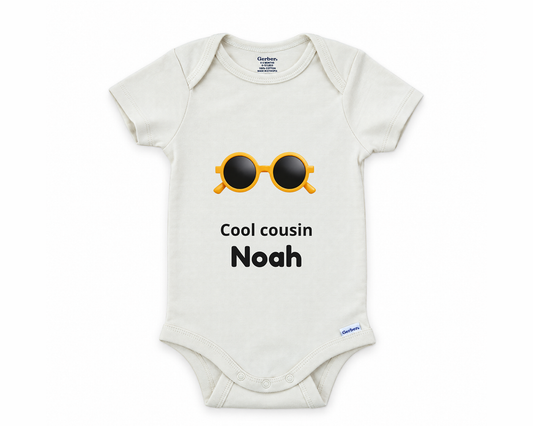 Cool Cousin personalized baby bodysuit with the sunglasses design on a white background
