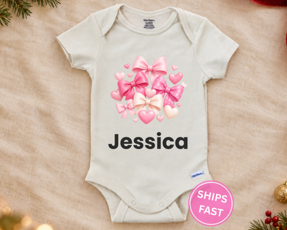 Jessica personalized baby bodysuit on a cream blanket with ships fast badge