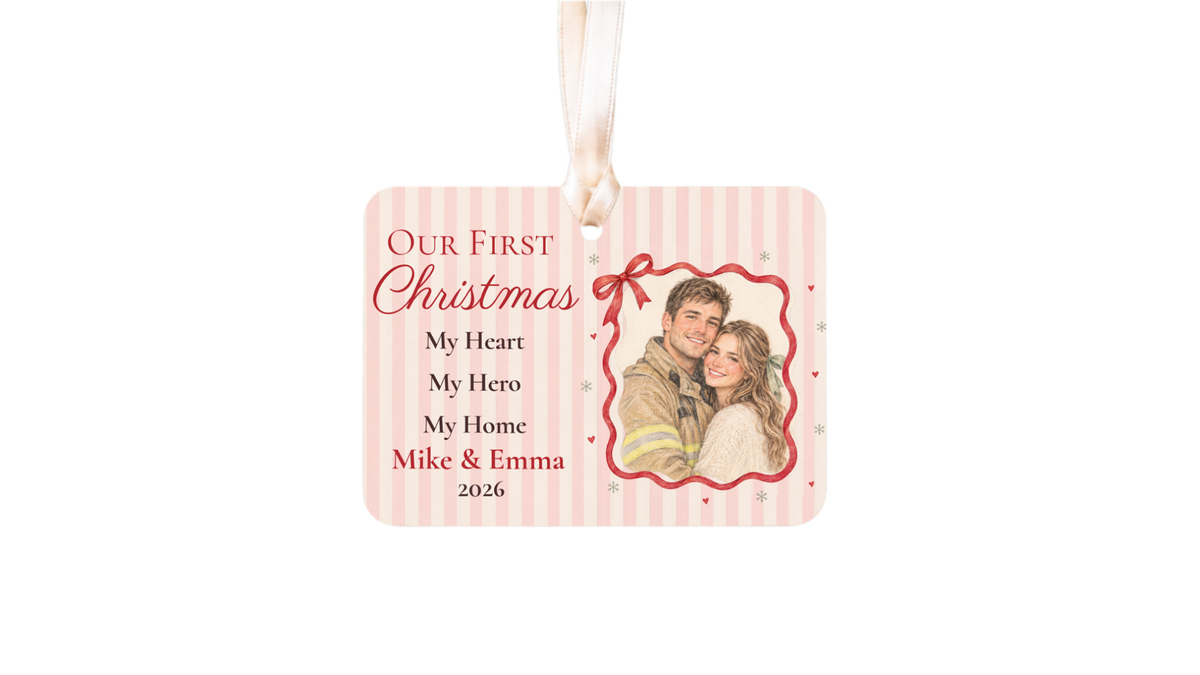 Our First Christmas firefighter couple ornament with a red ribbon photo frame on a white background