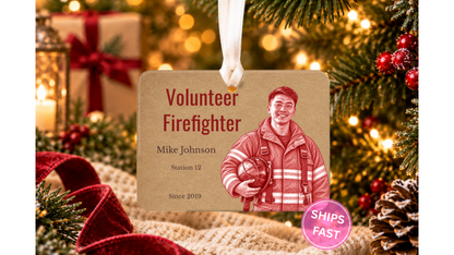 Volunteer Firefighter red pencil sketch ornament hanging by a ribbon on a Christmas tree with warm lights
